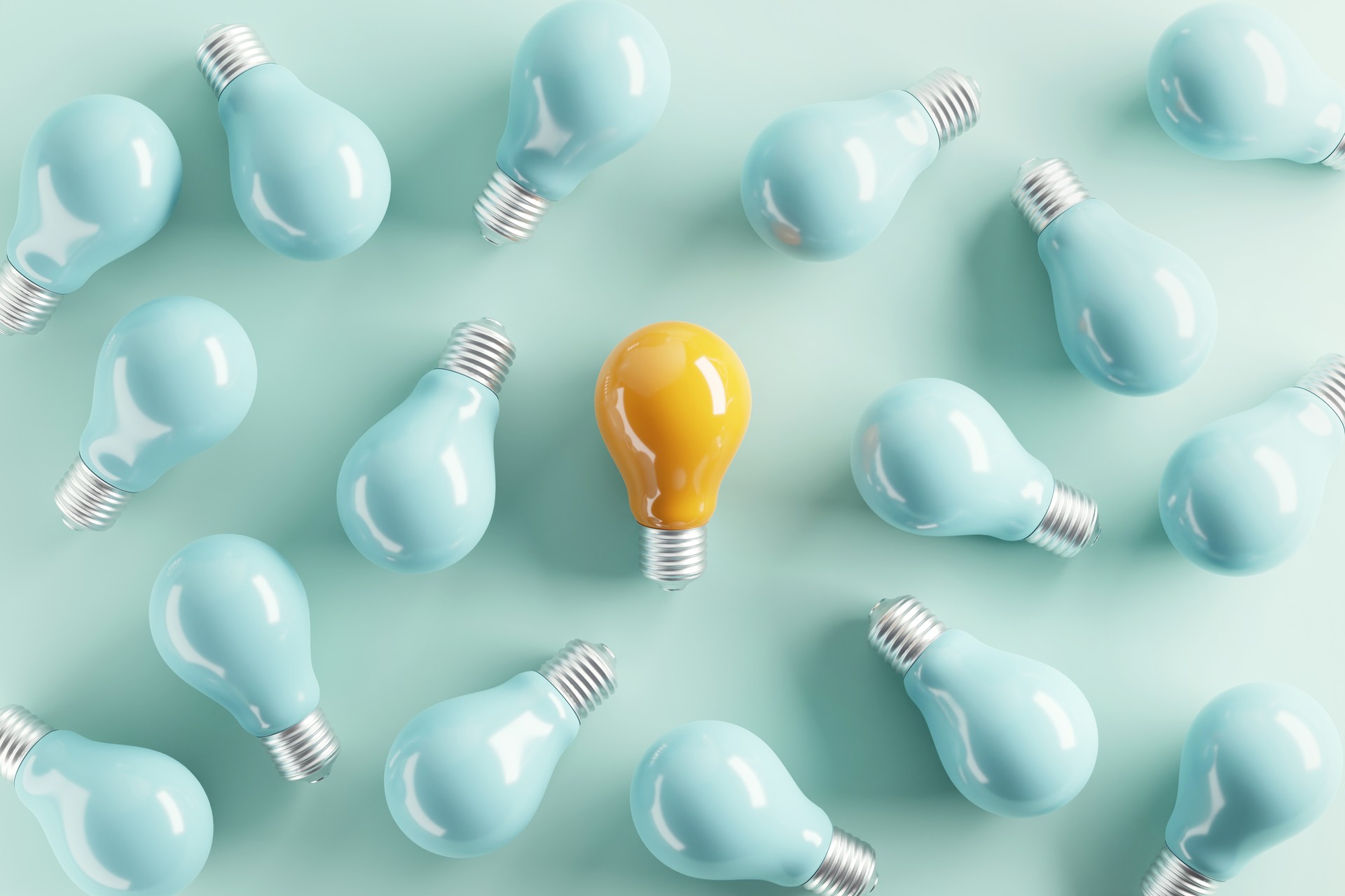 Minimal idea of yellow light bulb surrounded with blue bulbs on pastel background. 3d rendering. Idea creative Concept. Copy space. Minimal idea of yellow light bulb surrounded with blue bulbs on pastel background. 3d rendering. Idea creative Concept. Copy space.